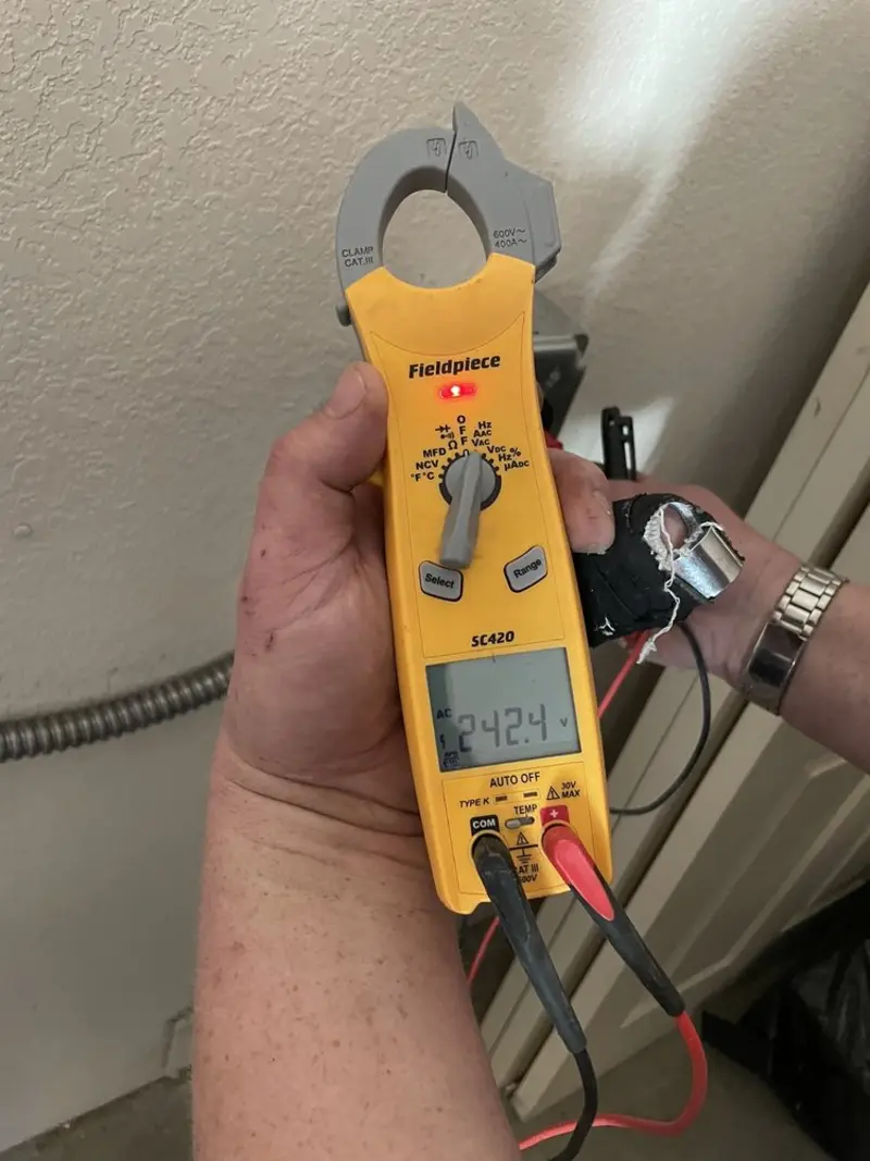 Voltage testing with clamp meter during Electrical Installation Services in El Segundo